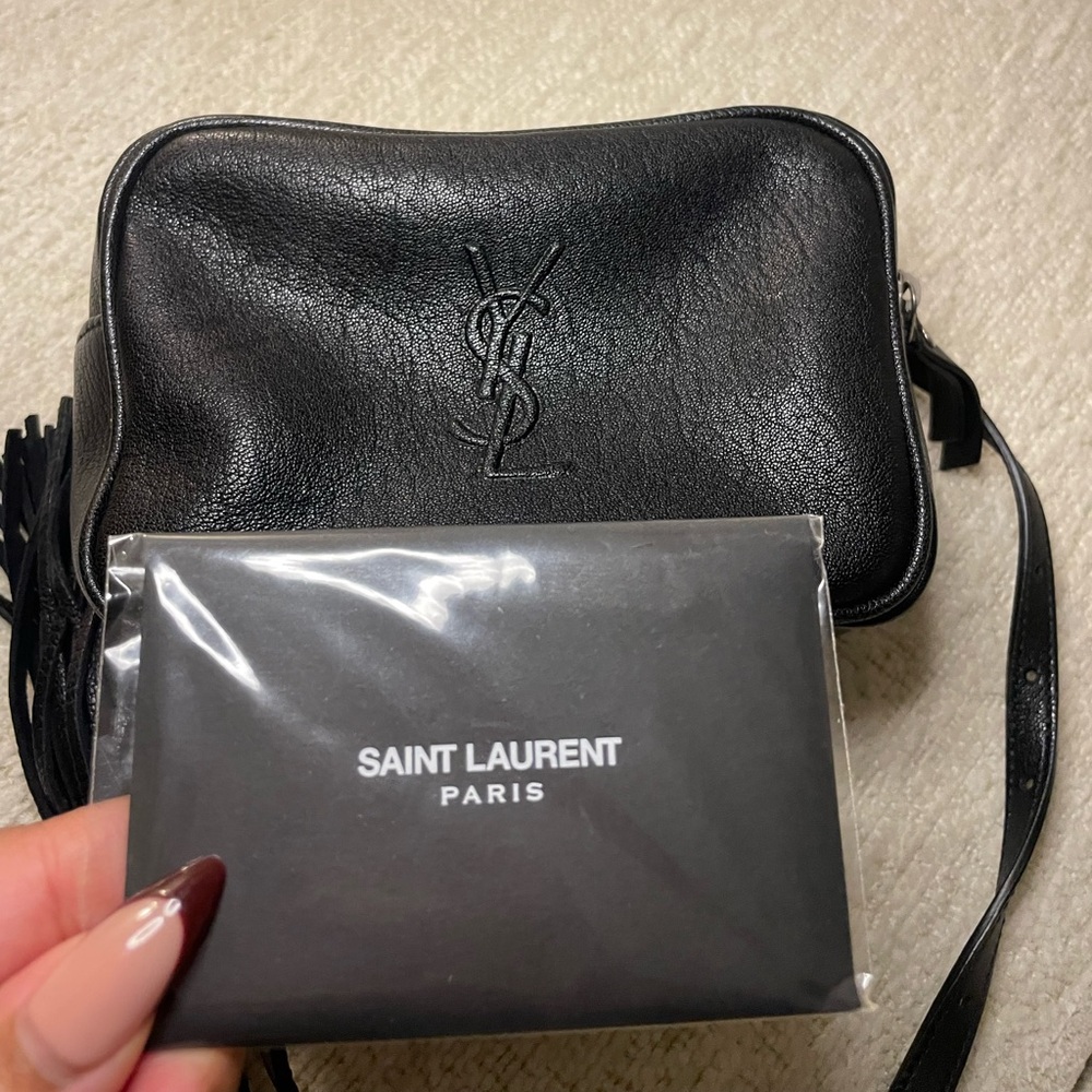 Gently Used YSL Monochromatic Black pouch with crossbody strap.